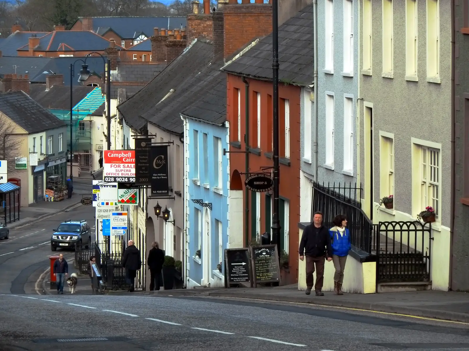 Painted Georgian terraces on Main Street, Hillsborough, with their roofs facing the street