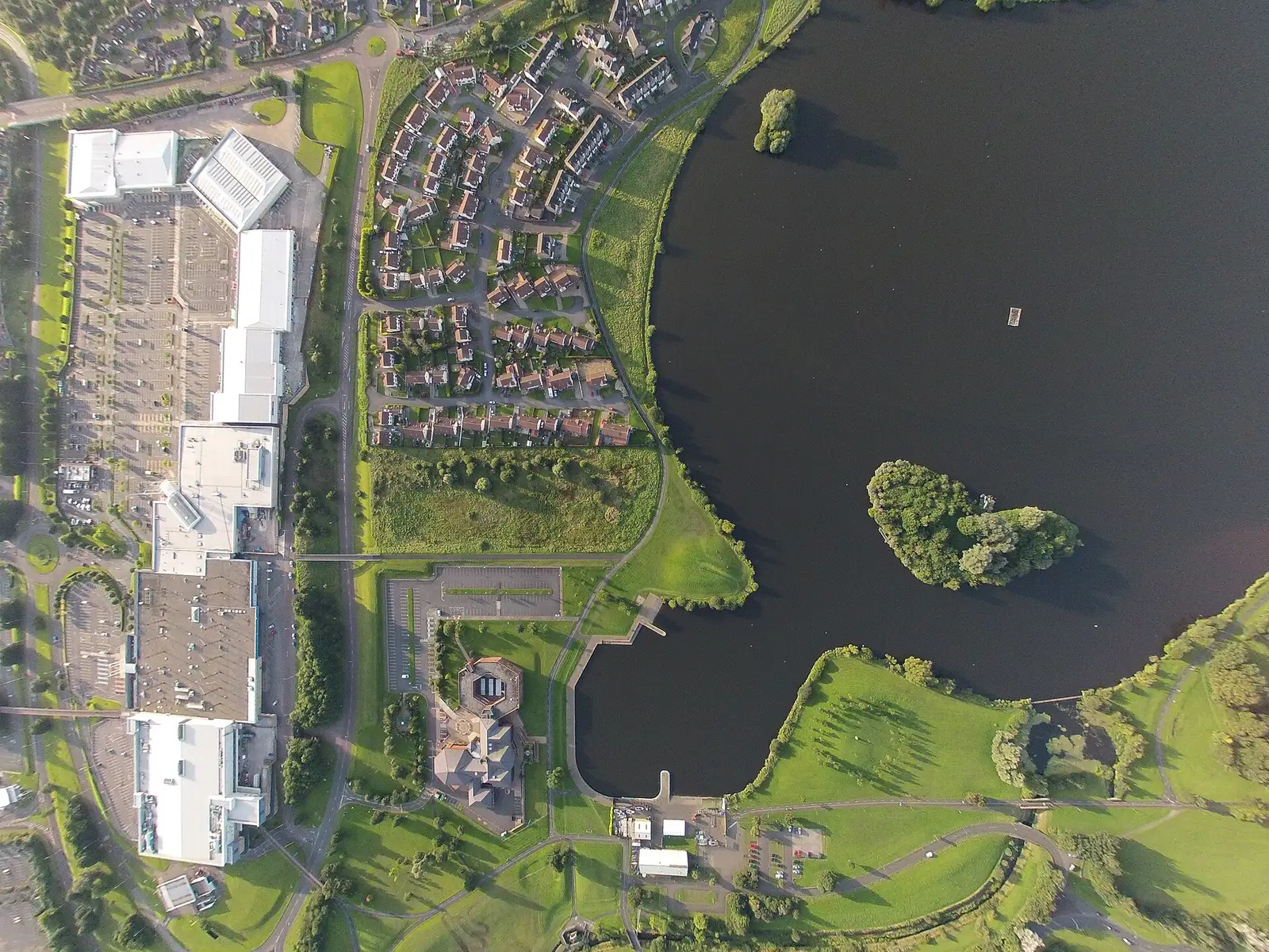 Aerial view of Craigavon lake, watersports centre, shopping centre and civic centre